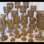 Red-and-Gold-Indian-Wedding-Centerpiece-Ideas-Gold-Candelabra-holder-Rentals-Wedding-Centerpiece